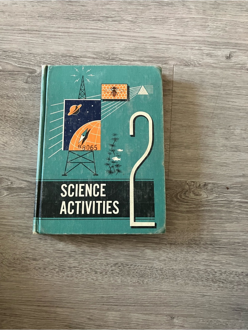 3/$15 Science Activities Book - Teal Cover with Black & Orange Accents
